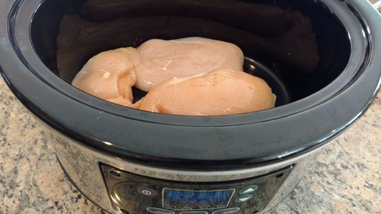 Slow Cooker full of healthy cooking ingredients