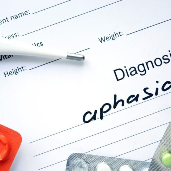 Diagnosis aphasia and tablets. Medicine concept.