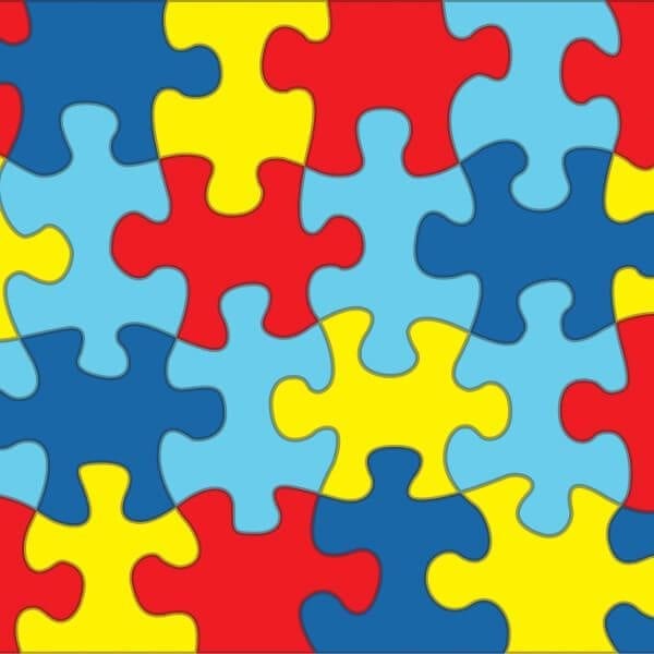 A colorful autism awareness puzzle background illustration. Vector EPS 10 available.