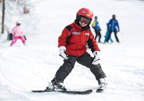 child skiing
