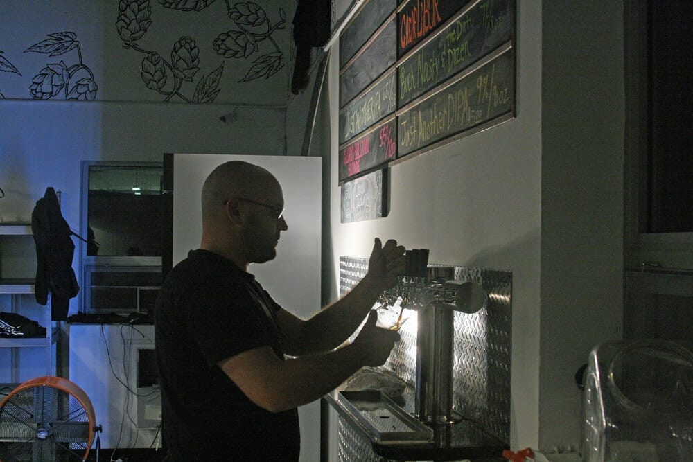 Server Pouring Beer from Tap