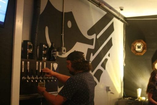 pouring beer from tap