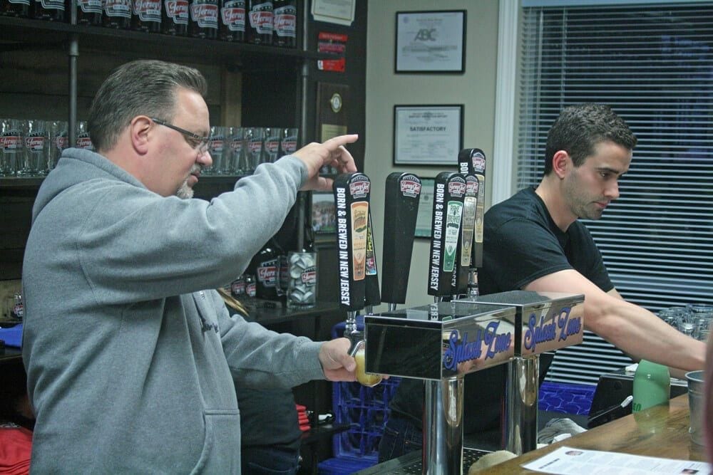 pouring beer from tap