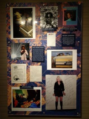 Collection of Items featuring Richie Sambora, Whitney Houston, Paul Simon, and Wyclef John.