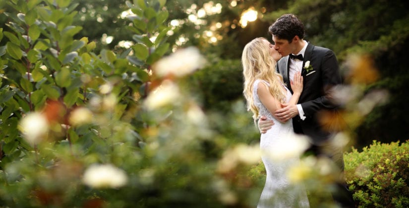 Gabelli Studio Couple Kissing in Garden