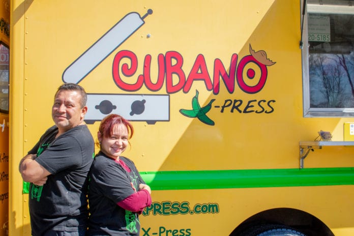 Brenda Rosa and Henry Sanchez in front of Cubano X-Press Food Truck