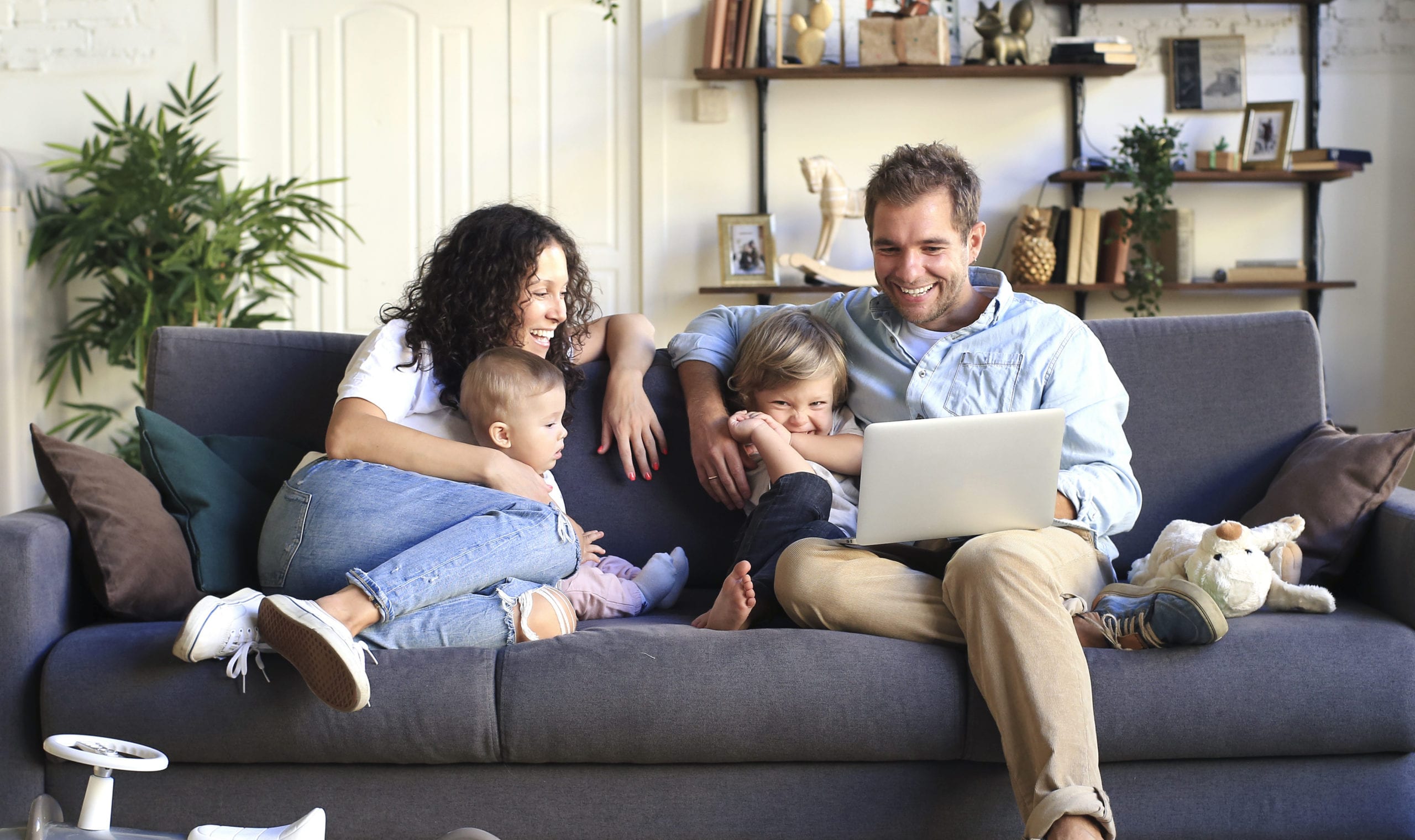 Family taking Virtual Tour on Laptop