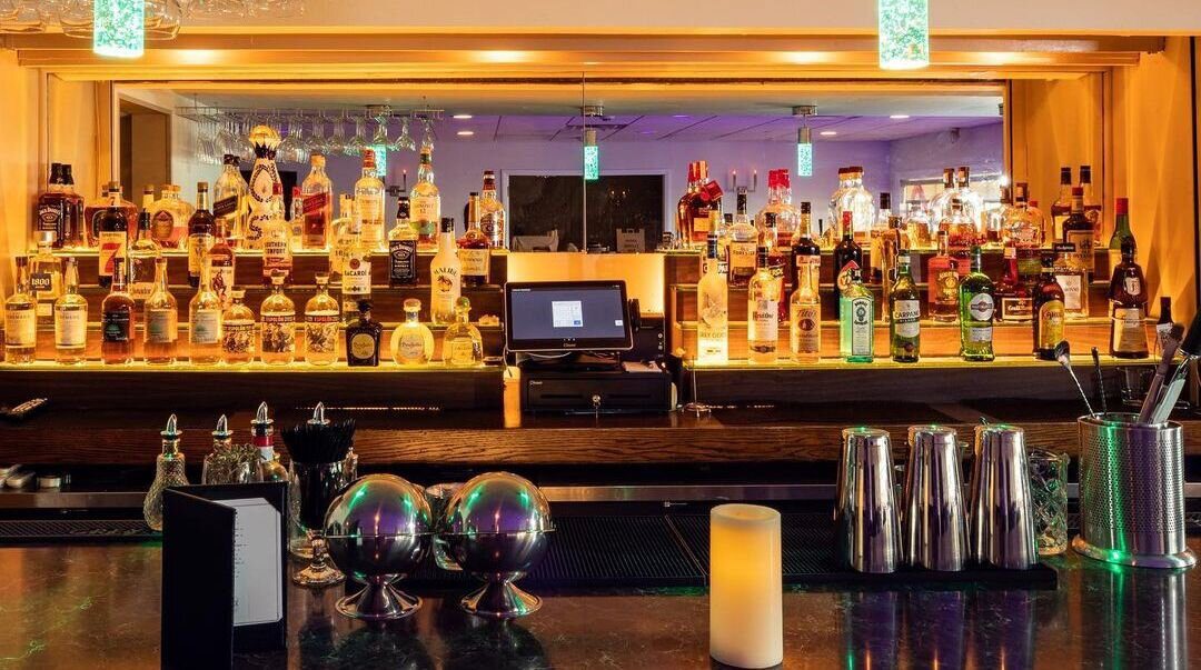 Bar Counter with Shelf full of drinks