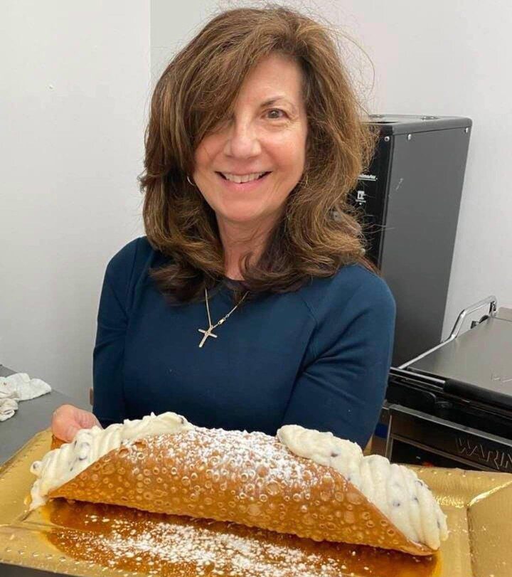 Donna with Cannoli
