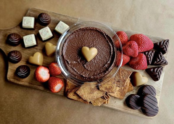 Selection of chocolates arranged on board