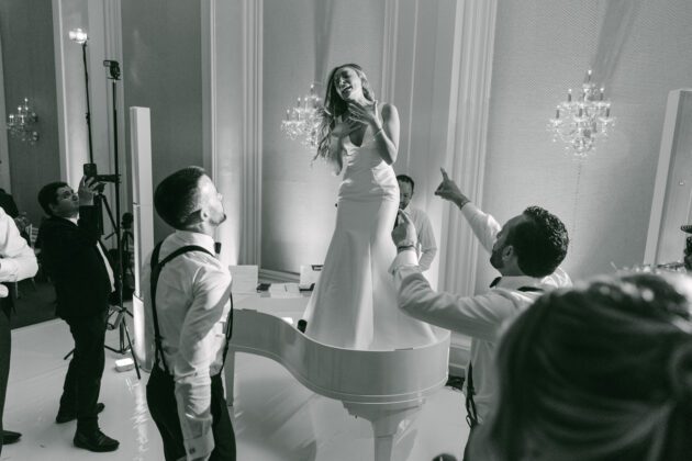 Bride standing on Piano