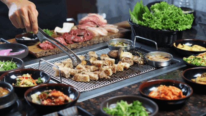 Chef preparing dinner at Wooga, one of the Best Korean BBQ Restaurants in New Jersey