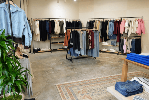 high end fashion hanging on racks