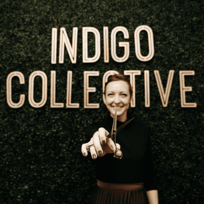 Indigo Collective Owner Posing with Scissors